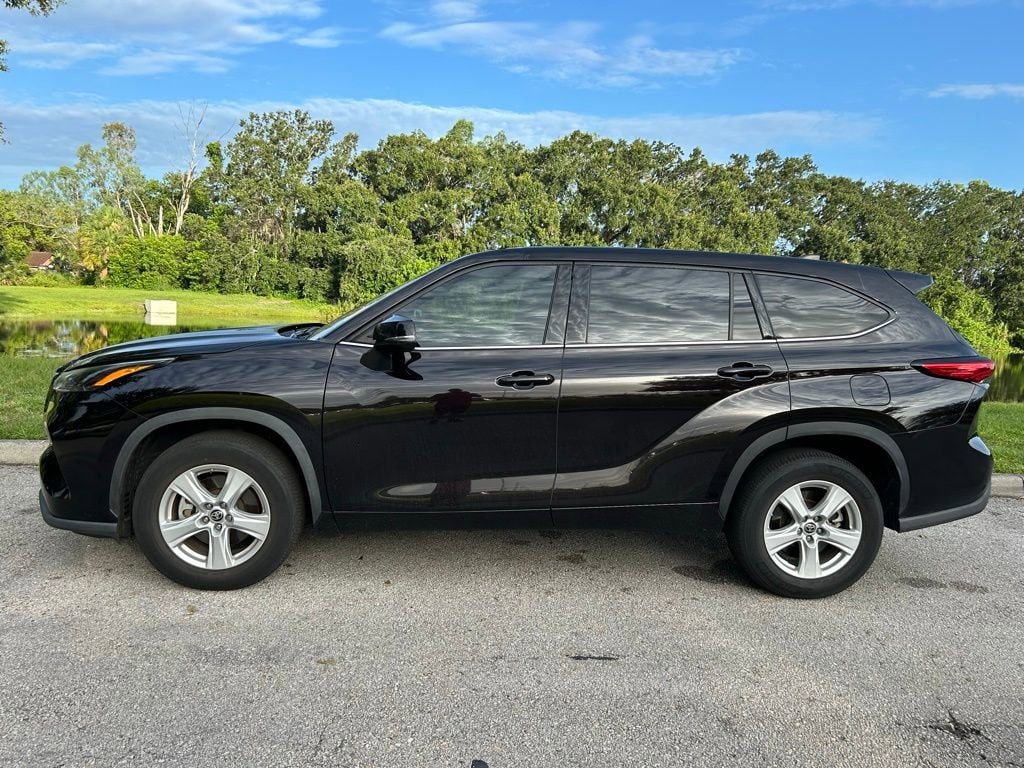 Certified 2022 Toyota Highlander L with VIN 5TDCZRAH0NS105010 for sale in Orlando, FL