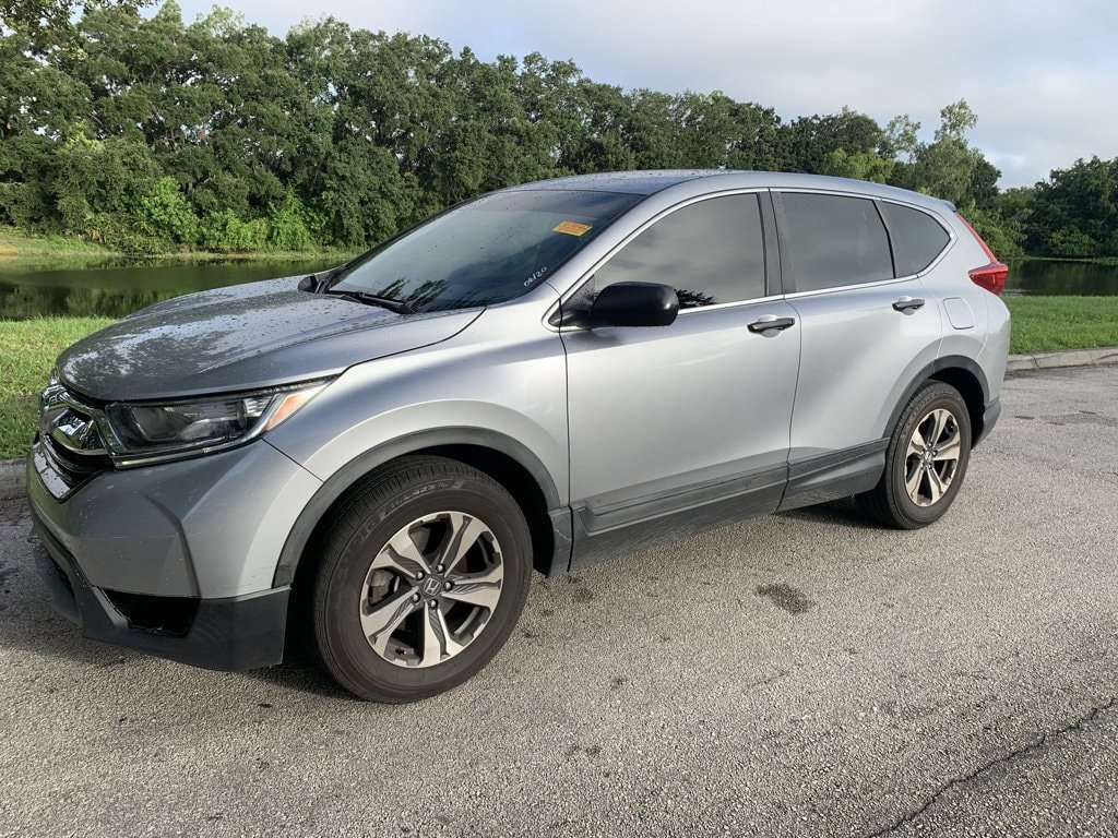Used 2019 Honda CR-V LX with VIN 2HKRW5H36KH416903 for sale in Orlando, FL