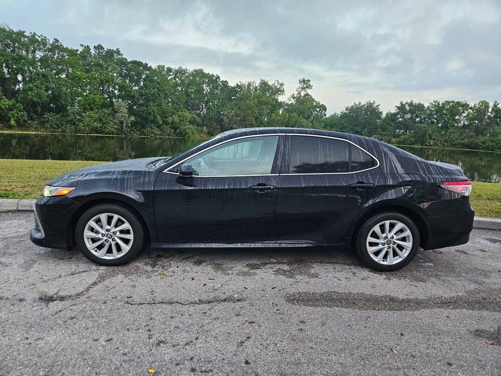 Used 2022 Toyota Camry LE with VIN 4T1C11AK0NU707126 for sale in Orlando, FL