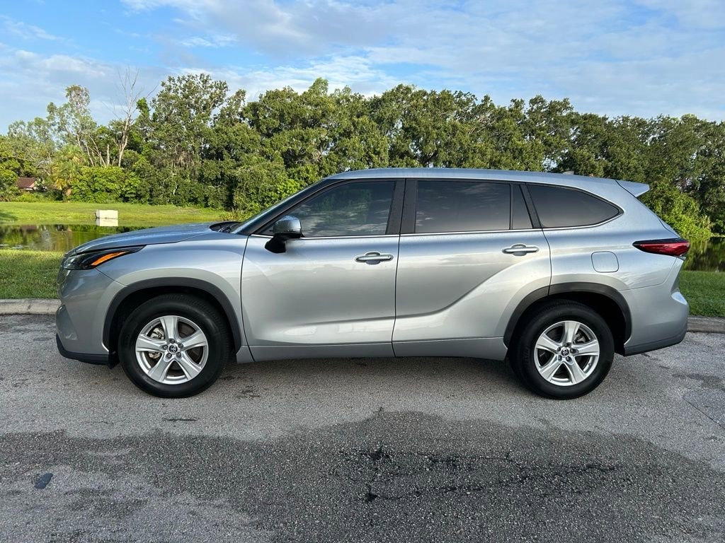 Certified 2023 Toyota Highlander LE with VIN 5TDKDRAH4PS509425 for sale in Orlando, FL