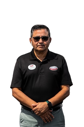 Staff member Farooque Bashir from ID_42d364