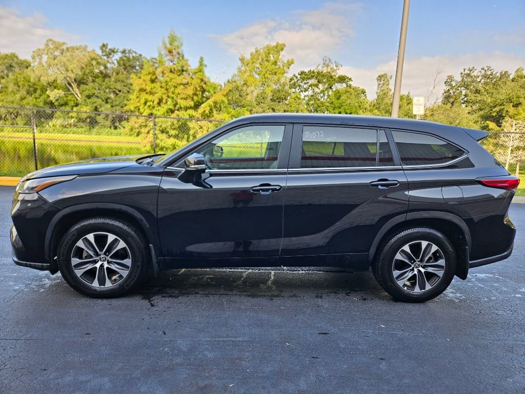 Used 2023 Toyota Highlander XLE with VIN 5TDKDRBH0PS029364 for sale in Orlando, FL