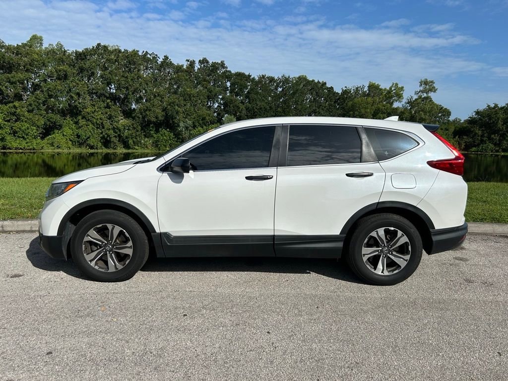 Used 2019 Honda CR-V LX with VIN 2HKRW5H37KH413704 for sale in Orlando, FL