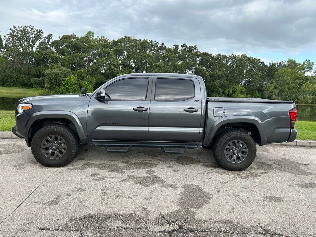 Certified 2023 Toyota Tacoma SR5 with VIN 3TMCZ5AN2PM619863 for sale in Orlando, FL