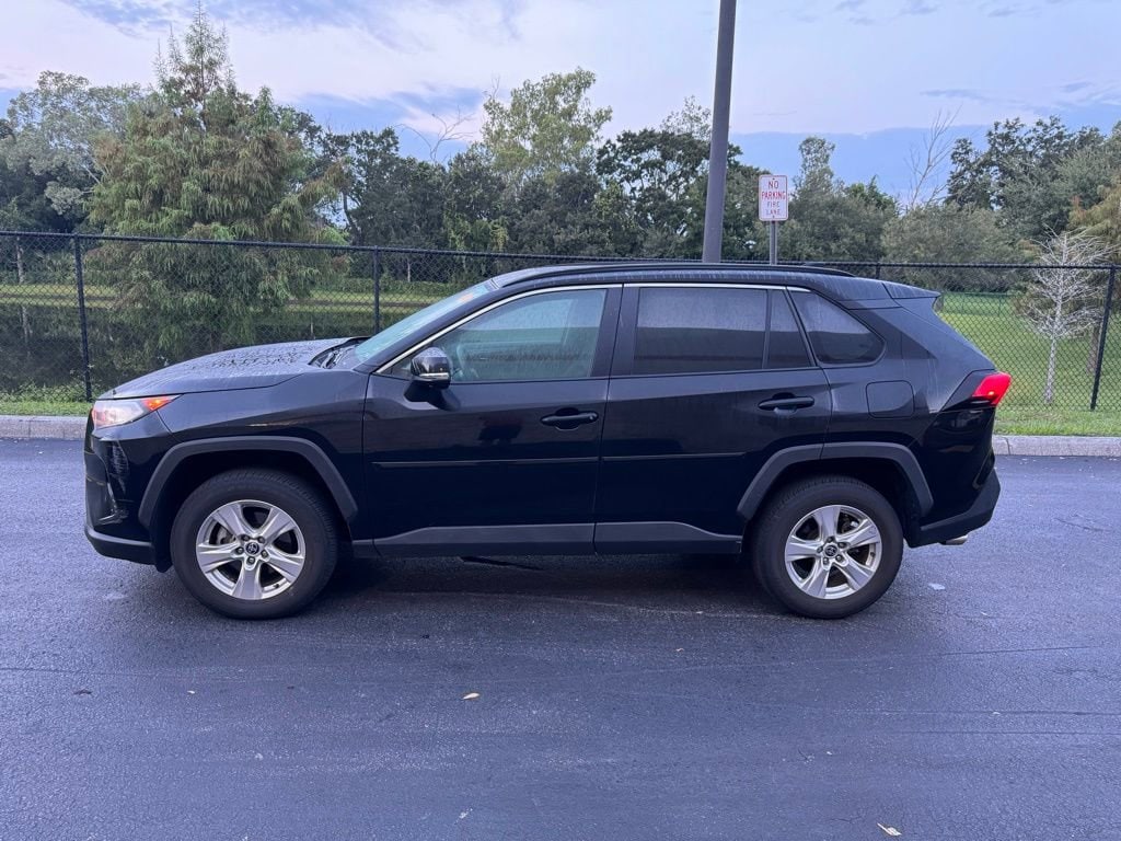 Used 2021 Toyota RAV4 XLE with VIN 2T3P1RFV8MC241469 for sale in Orlando, FL