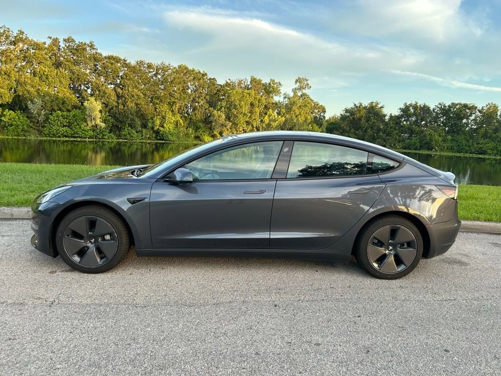Used 2023 Tesla Model 3 Base with VIN 5YJ3E1EA8PF700642 for sale in Orlando, FL