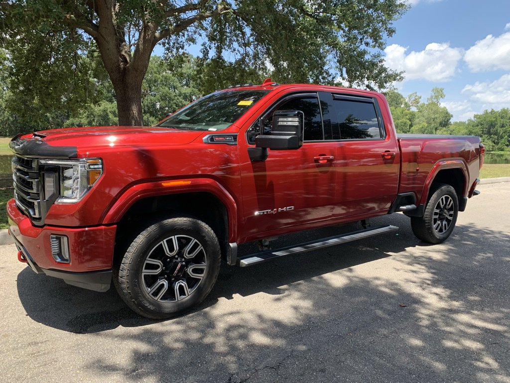 Used 2022 GMC Sierra 2500HD AT4 with VIN 1GT49PE74NF256247 for sale in Orlando, FL