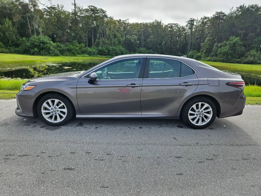 Used 2022 Toyota Camry LE with VIN 4T1C11AK5NU686242 for sale in Orlando, FL