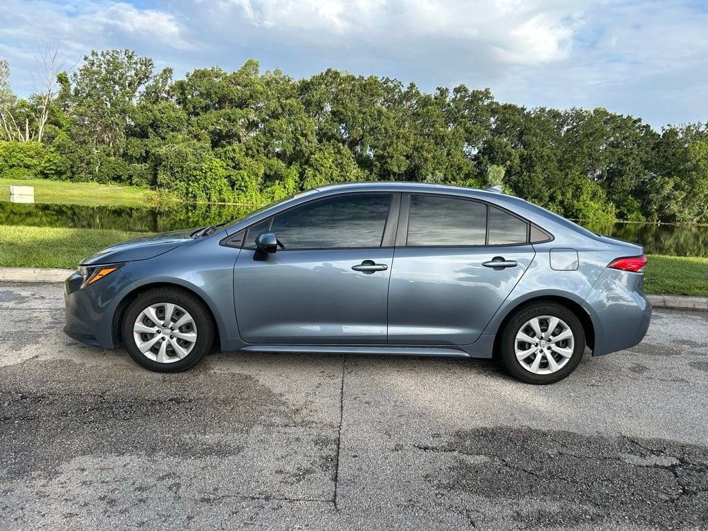Used 2022 Toyota Corolla LE with VIN JTDEPMAEXN3009068 for sale in Orlando, FL