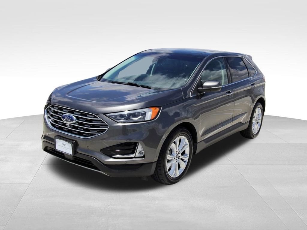 Used 2020 Ford Edge Titanium with VIN 2FMPK3K96LBA60014 for sale in Houston, TX