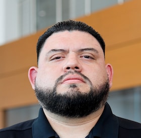 Staff member Ron Marquez from ID_494486d077f1