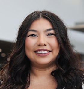 Staff member Irma Evangelista from ID_85968306f7fe