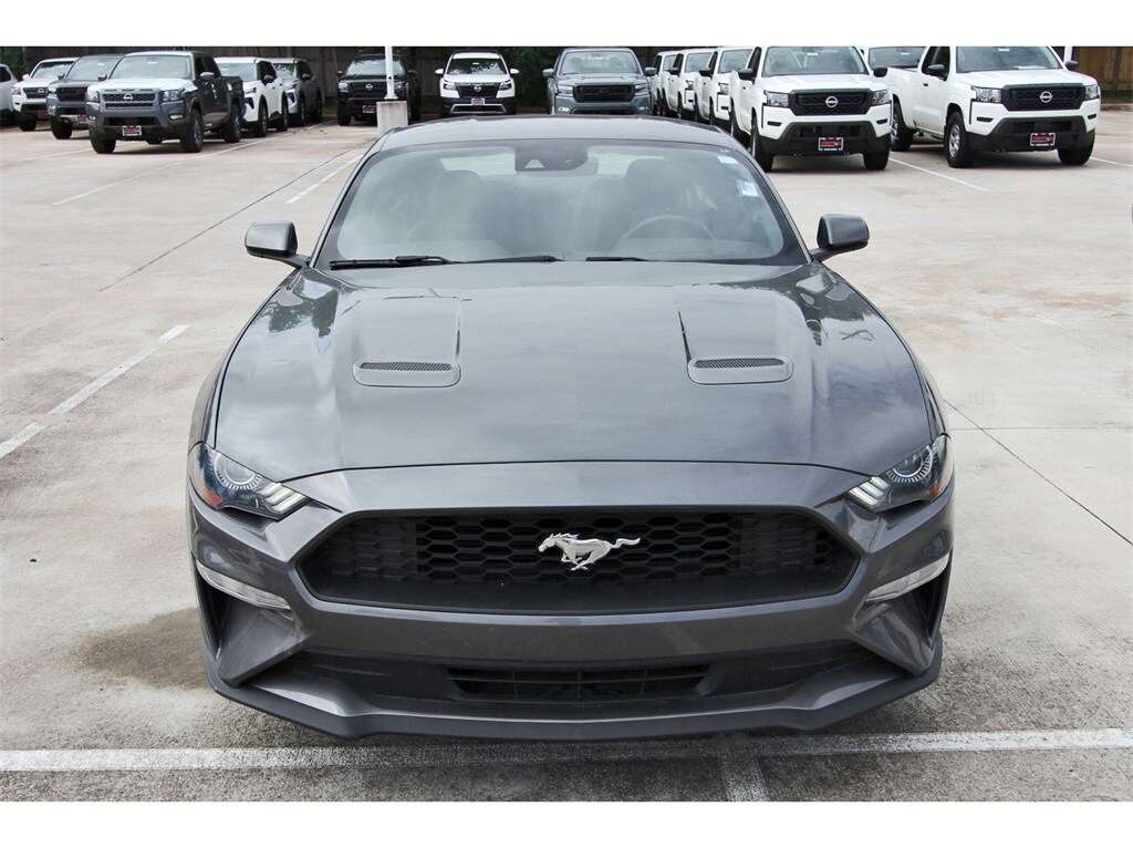 Used 2021 Ford Mustang EcoBoost with VIN 1FA6P8TH9M5147907 for sale in Houston, TX