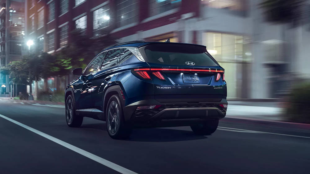 2024 Hyundai Tucson Hybrid driving rear view