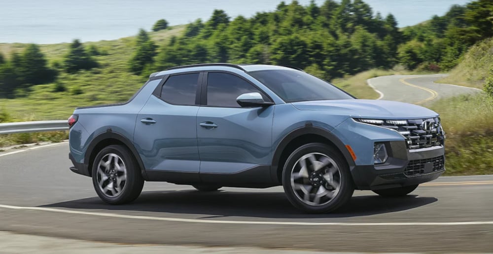 2024 Hyundai Santa Cruz driving down the road