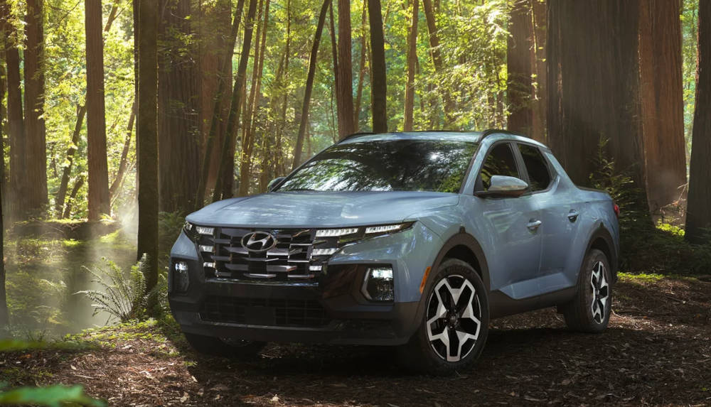 2024 Hyundai Santa Cruz driving in the woods