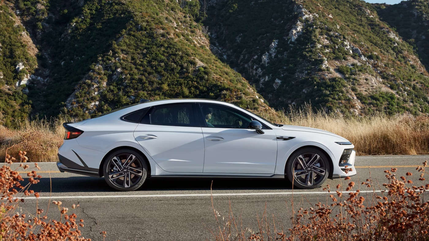 2024 Hyundai Sonata Hybrid driving through the mountains