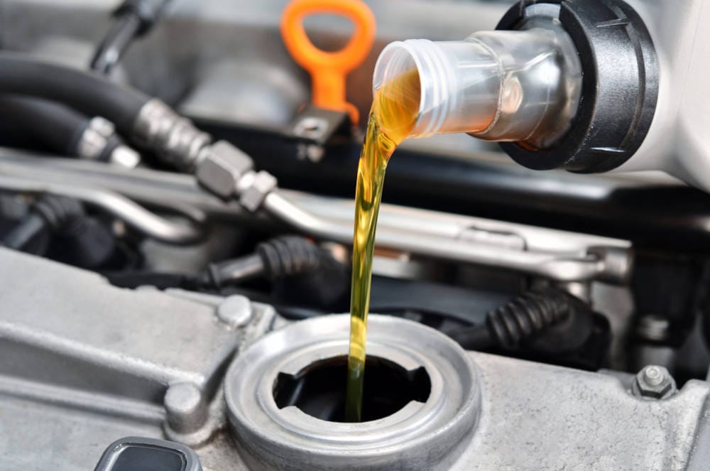 Oil pouring into an Engine