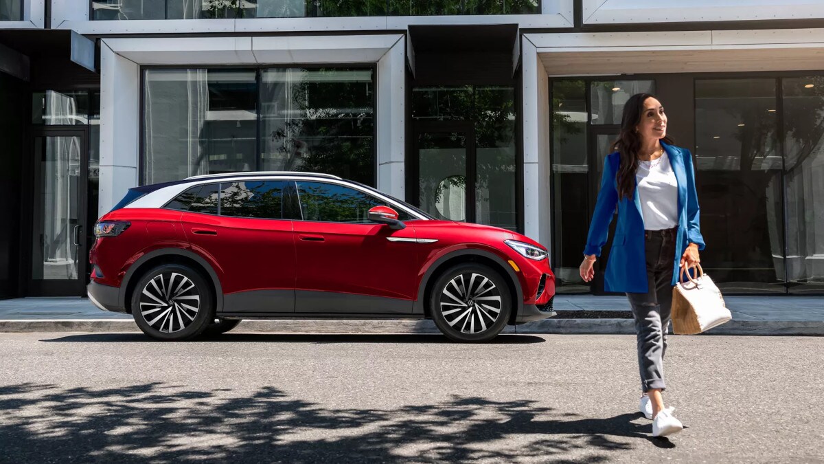 VW Car parked with women walking away