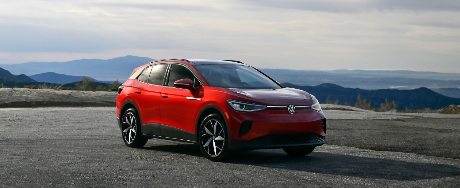 2024 Red Volkswagen id4 driving down the road