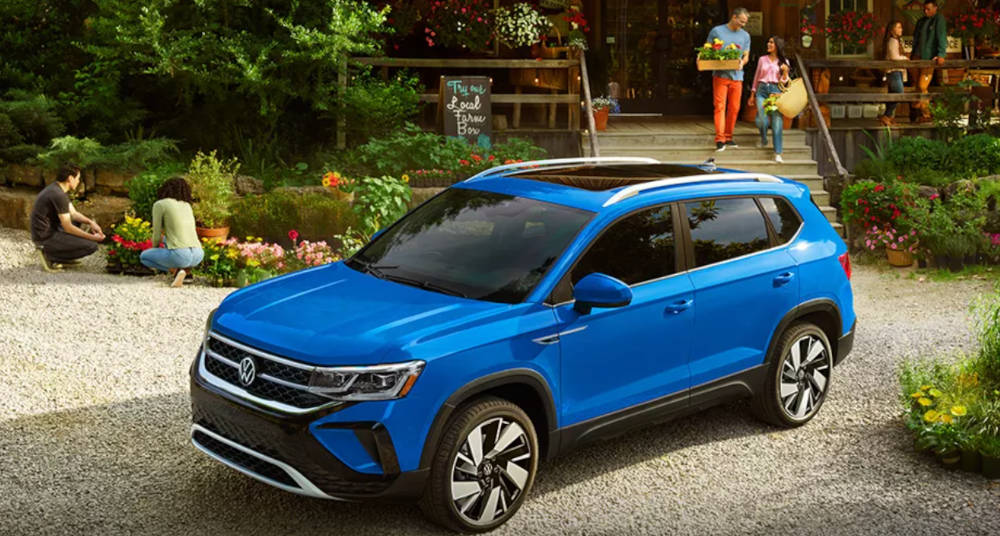 Volkswagen Taos parked at a garden center