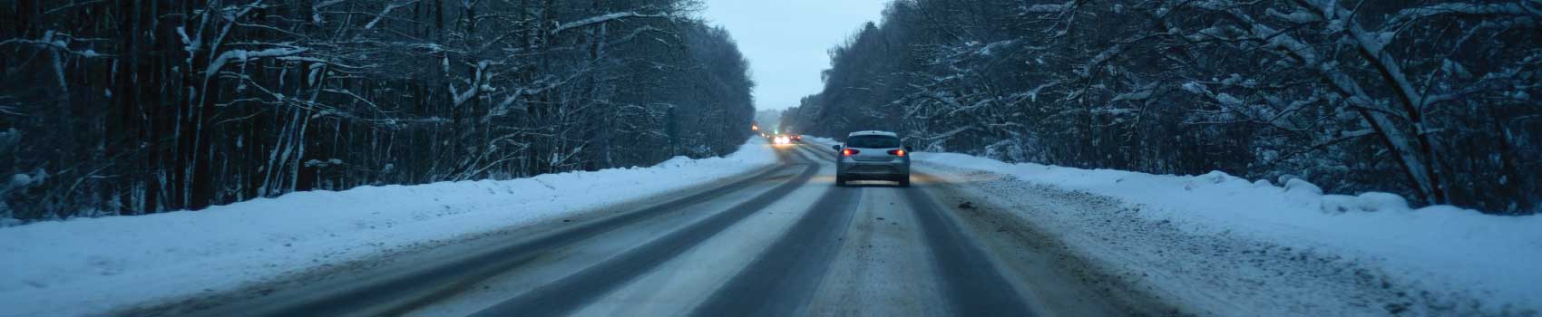 Vehicle prepared for winter driving on a snowy Vermont road