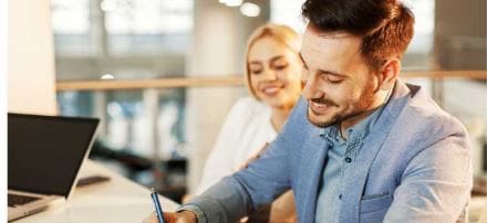 Customers with bad credit buying a used car at Central Vermont Auto Mart in Montpelier, Vermont.
