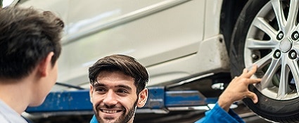 Happy customer finding a quick easy service appointment for his car at Central Vermont Auto Mart in Montpelier, Vermont.