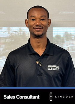 Staff member Romario Smith from 64a765cabcbe