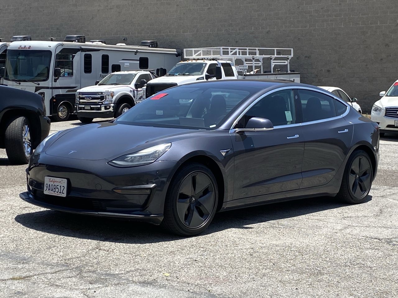 Used 2018 Tesla Model 3 Long Range with VIN 5YJ3E1EA7JF153676 for sale in Cerritos, CA