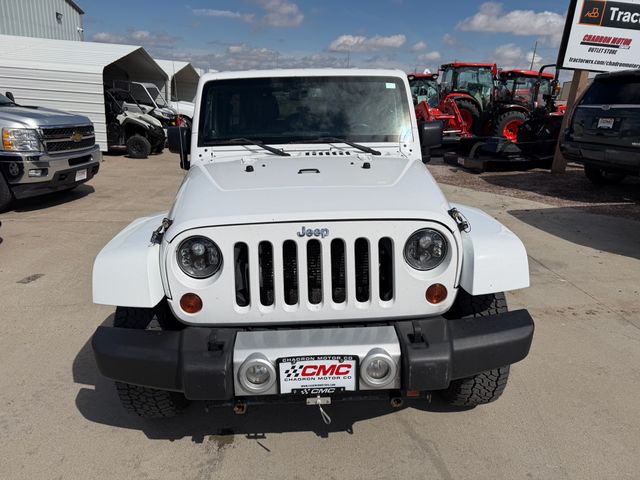 Used 2013 Jeep Wrangler Unlimited Sahara with VIN 1C4BJWEG6DL636022 for sale in Chadron, NE