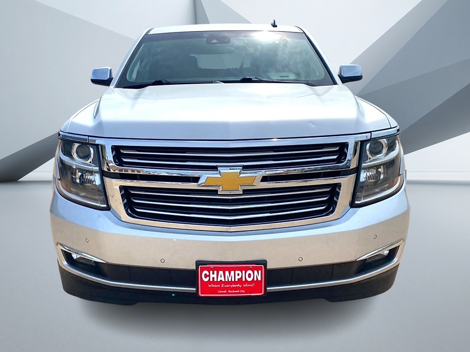 Used 2015 Chevrolet Tahoe LTZ with VIN 1GNSKCKC2FR223809 for sale in Carroll, IA