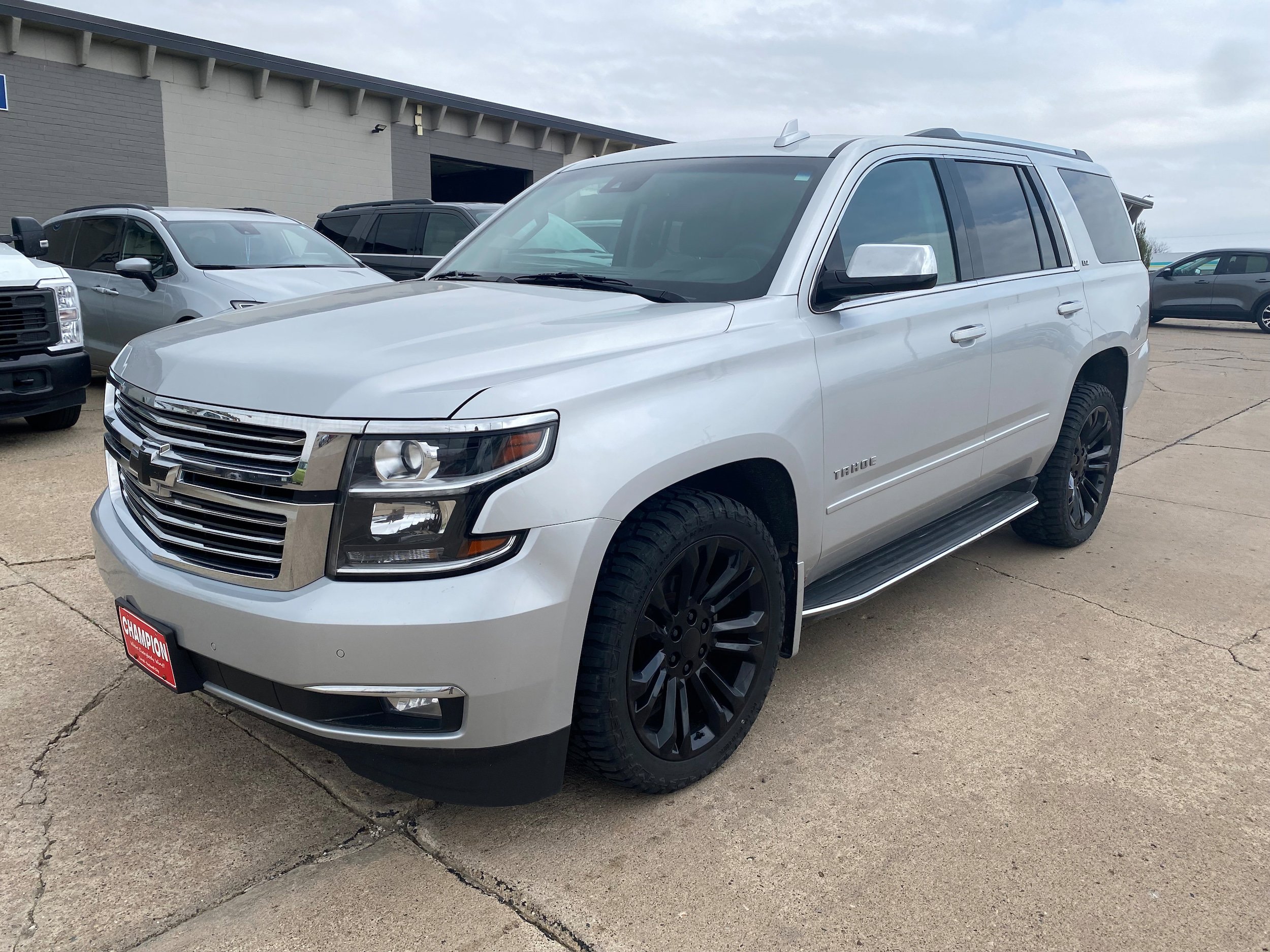 Used 2016 Chevrolet Tahoe LTZ with VIN 1GNSKCKC0GR133110 for sale in Carroll, IA