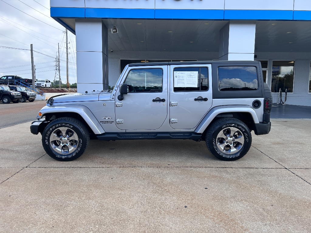 Used 2016 Jeep Wrangler Unlimited Sahara with VIN 1C4BJWEGXGL249025 for sale in Athens, AL