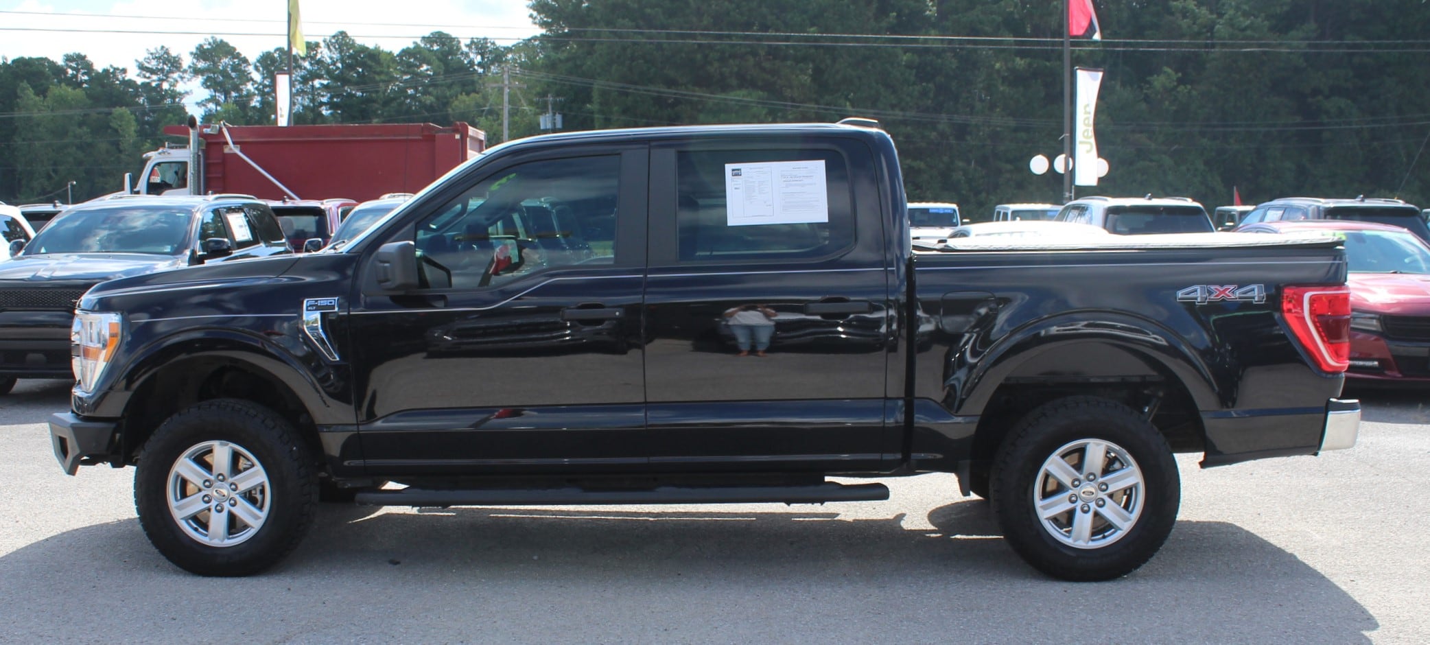 Used 2021 Ford F-150 XLT with VIN 1FTFW1E83MKD12370 for sale in Decatur, AL