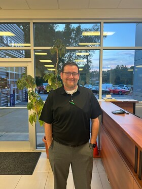 Staff member John Holmes from 023c39b556dd