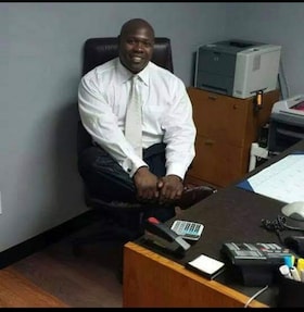 Staff member Sam Wyche from 023c39b556dd