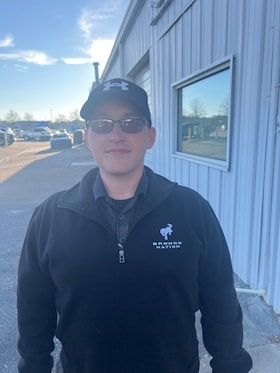 Staff member Christopher Norton from 023c39b556dd