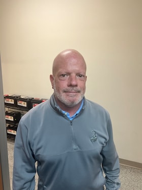 Staff member Russell Self from da3886bc731d