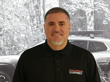 Staff member Carlos Lopez from 3c79ab7fc330