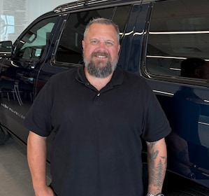 Staff member JUSTIN COE from 1191dce57634