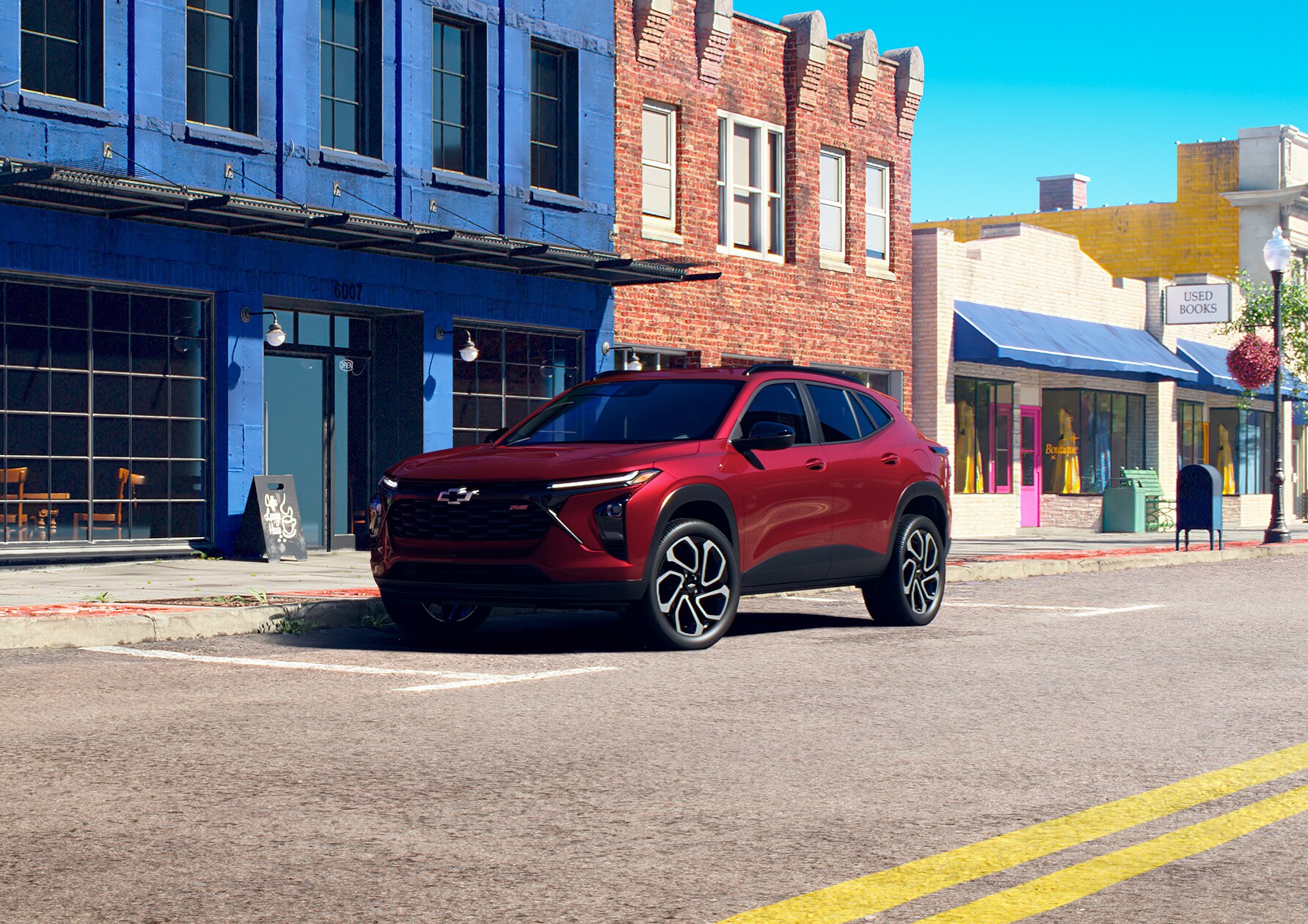 Happy couple walking to their parked Chevy Trax.