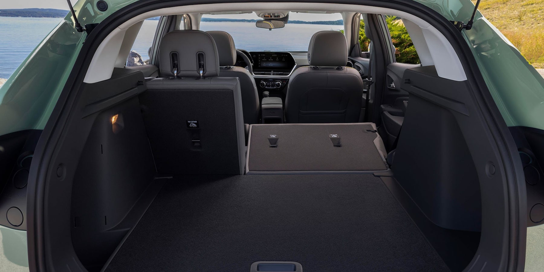 Inside back of a 2025 Chevy Trax with the seats folded down.