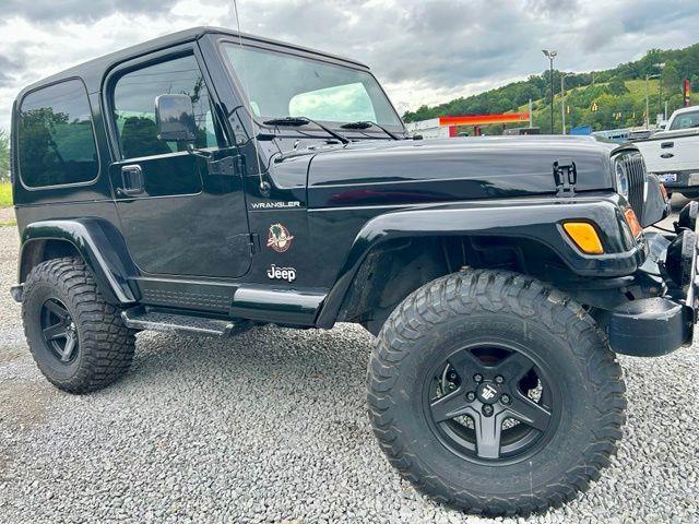 Used 2002 Jeep Wrangler SAHARA with VIN 1J4FA59S62P735899 for sale in Dayton, TN