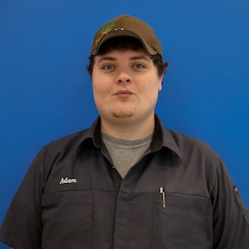 Staff member Adam Towle from ID_d9084a180d07