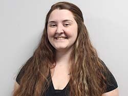 Staff member Sarah Hart from ID_d9084a180d07