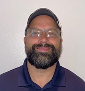 Staff member Seth Poland from 7202fa07b158
