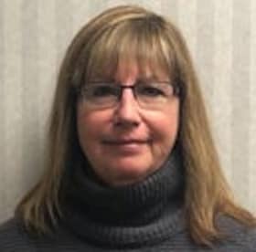 Staff member Linda Mullet from 7cf778bac6bc
