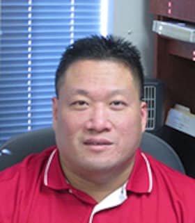 Staff member Dennis Yu from 7e8768b2d40d