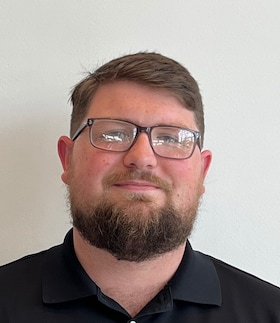 Staff member Brandon Spradlin from ID_a8c53de29ab3